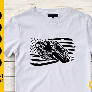 May include: White t-shirt featuring a black graphic of a motorcycle racer with an American flag design. The shirt includes the text "SVG, DXF, PNG, EPS, AI, INSTANT DOWNLOAD". The ButterStar Digital logo is in the bottom right corner.