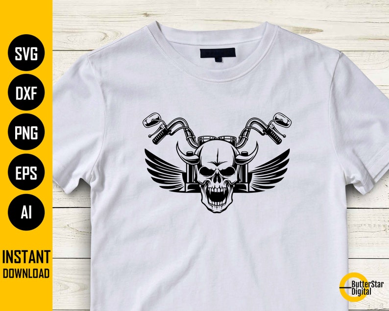 May include: White t-shirt featuring a black graphic of a skull with motorcycle handlebars and wings. The design includes the text "INSTANT DOWNLOAD" and file type labels. The ButterStar Digital logo is in the bottom right corner.