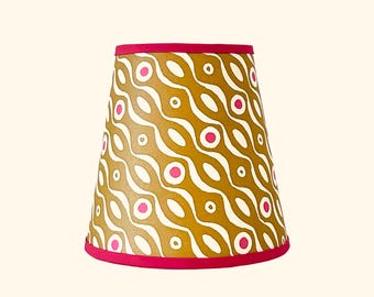 Vibrant paper lampshades bursting with intense colour. The "Happy" Collection.