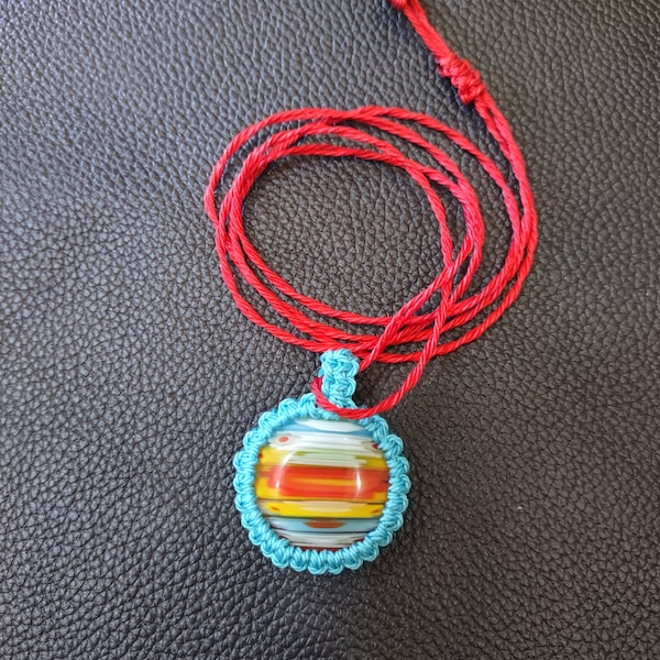 Handmade Macramed Millifiori Glass pendant on an adjustable macrame twisted cord to 28 in.