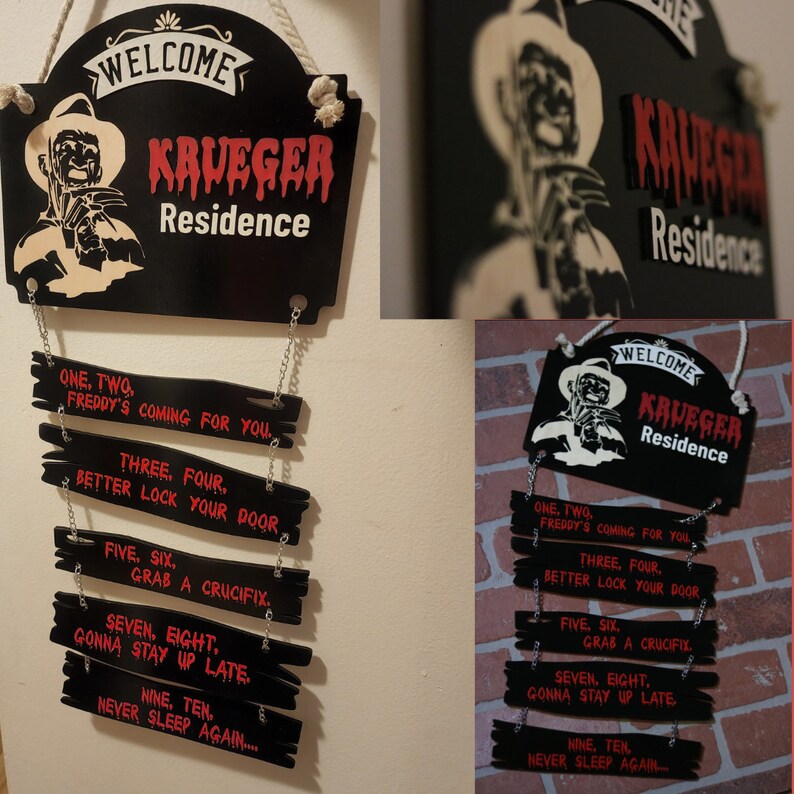 May include: A black wooden sign with the words "Welcome Krueger Residence" in red and white lettering.  The sign is hanging from a rope and has a series of smaller wooden signs hanging below it with the text "One, Two, Freddy's coming for you. Three, Four, Better lock your door. Five, Six, Grab a crucifix. Seven, Eight, Gonna stay up late. Nine, Ten, Never sleep again..." in red lettering.