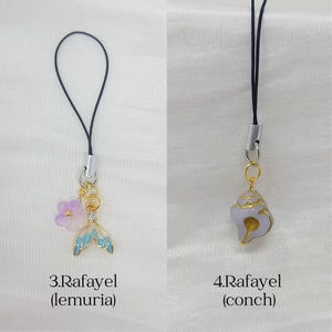 May include: Two phone charms with black cords. The first, labeled 3.Rafayel (lemuria), features a light purple flower and a blue and gold mermaid tail charm. The second, labeled 4.Rafayel (conch), features a light purple and gold conch shell charm.