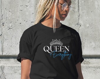 May include: Black t-shirt with a silver crown and the text "QUEEN of Everything" in white and blue lettering.
