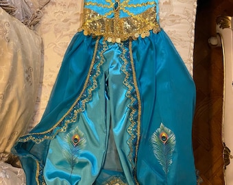 Completo di Jasmine. Costume Disney per bambina. Completo da principessa Jasmine della Disney.