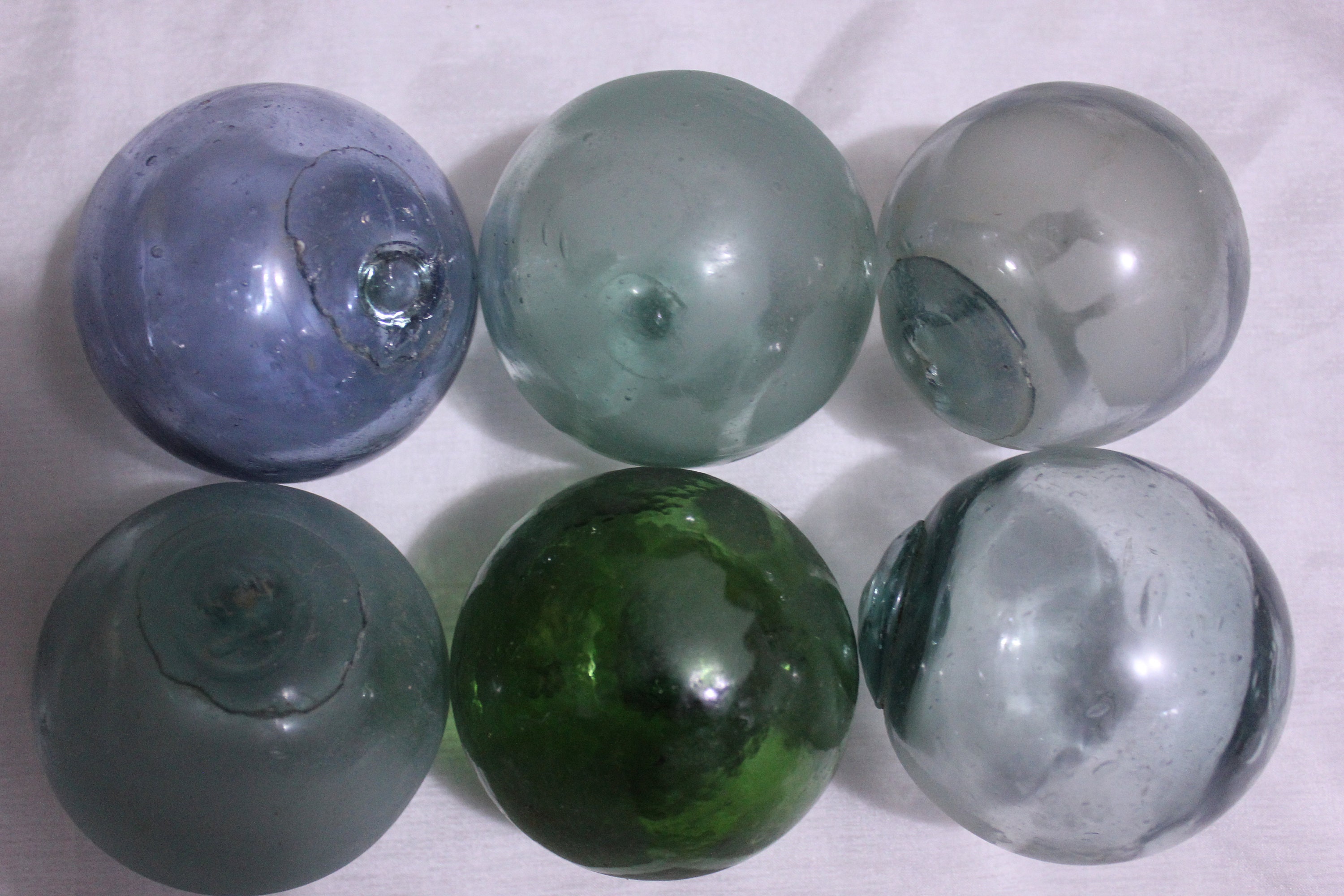 A Trio Of Vintage Japanese Glass Rollers Fishing Floats Handblown