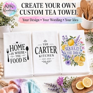 May include: Three white tea towels featuring custom designs. The first displays black text reading HOME IS WHERE THE FOOD IS with fork and spoon icons. The second shows THE CARTER KITCHEN EST. 2026. The third features a lemon and lavender floral graphic with the text SQUEEZE THE DAY.