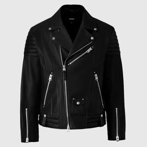 May include: Black leather motorcycle jacket with silver zippers and snap details. The jacket features a classic asymmetrical design, quilted shoulder accents, and multiple zippered pockets. A stylish outerwear piece.