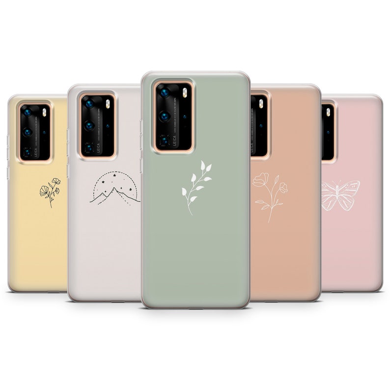 May include: Five phone cases with different minimalist designs. The cases are all clear and have a white design on them. The designs include a mountain range, a flower, a butterfly, a branch with leaves, and a branch with flowers.