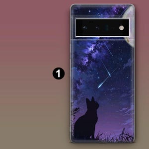 May include: A phone case with a black cat silhouette looking up at a starry night sky with shooting stars. The case has a clear background and a black camera cutout.
