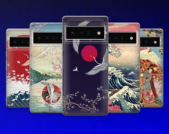 May include: Five different phone cases with Japanese-inspired designs. The cases feature images of cranes, cherry blossoms, mountains, and waves. The cases are all black and have a clear back.