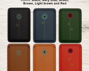 May include: Six leather phone cases with a stylized flower design. The cases are available in black, navy blue, green, brown, light brown, and red.