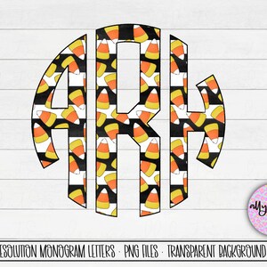 May include: A monogram letter design with a candy corn pattern. The letters are black with a yellow outline and are set against a white background. The candy corn pattern is in orange, yellow, and white.