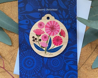 Tarjeta de decoración navideña de goma con flores rosadas