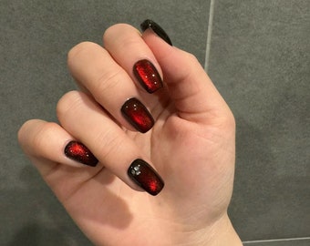 Rotes Katzenauge Drücken Sie auf die Nägel: Schwarzes Glitzergel, wiederverwendbare Acrylnägel