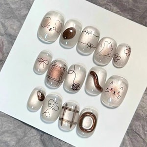 Leuke handgeschilderde kattenoognagels, kattenbloemenpers op nagels, handgemaakte draagbare nagels, draagbare nail art-patches, cartoon kittennagels
