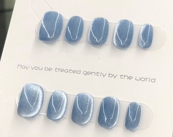 Blaue Katzenaugen-Gelnägel, Glitzerstern, handgemalte Maniküre