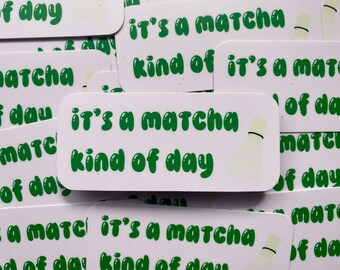 May include: A set of stickers with the text "It's a matcha kind of day" in green letters on a white background. The stickers feature a white whisk illustration.
