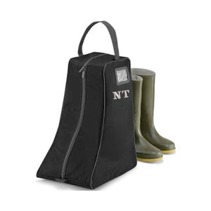 May include: Black boot bag with a zipper closure and a gray handle. The bag has a gray pocket on the front with the initials "NT" embroidered in white. A pair of green rubber boots are next to the bag.