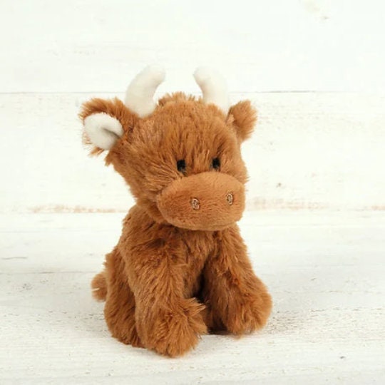 fluffy brown cow stuffed animal