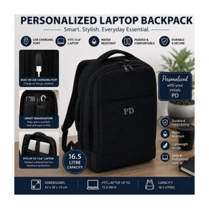 May include: A black laptop backpack with the initials PD embroidered on the front. Features include a built-in USB charging port, a padded compartment for a 15.6 inch laptop, and a 16.5 liter capacity. The dimensions are 42 x 30 x 14 cm.