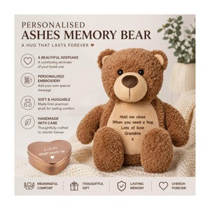 May include: A brown plush teddy bear with a tan belly featuring the embroidered text 'Hold me close, When you need a hug, Lots of love, Grandma x'. Beside the bear is a metallic heart-shaped tin. The background includes text describing the product.