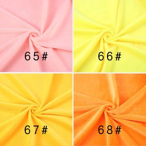 May include: A grid of four fabric swatches in pink, light yellow, golden yellow, and orange. Each swatch features a central swirl pattern and is labeled with black text: 65#, 66#, 67#, and 68# respectively, indicating distinct color options.