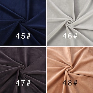May include: A grid of four fabric swatches featuring a soft, plush texture. The top left is dark navy blue labeled 45#, top right is light gray labeled 46#, bottom left is dark charcoal gray labeled 47#, and bottom right is light tan labeled 48#.