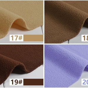May include: Four fabric swatches in different colours: beige, brown, dark brown, and light purple. The swatches are labelled with numbers 17, 18, 19, and 20.