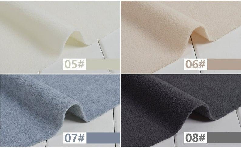 May include: Four fabric swatches in different colours: white, beige, light blue, and dark grey. The swatches are labelled with numbers 05, 06, 07, and 08.