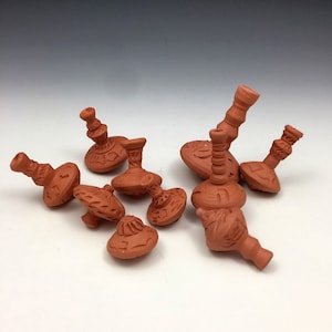 Dreidels that you can spin that are really made out of clay! Functional clay art!