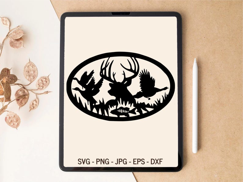 May include: Black and white silhouette of a deer, two birds, and a fish inside a circle. The deer is standing in the center of the circle with its head tilted to the side. The birds are flying around the deer, and the fish is swimming below the deer.