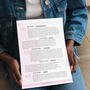 May include: A pink and black motivational poster with the text "Become Indifferent" and "Give Him Space" in pink. The poster is divided into five sections, each with a number and a title. The poster is held by a person's hands.