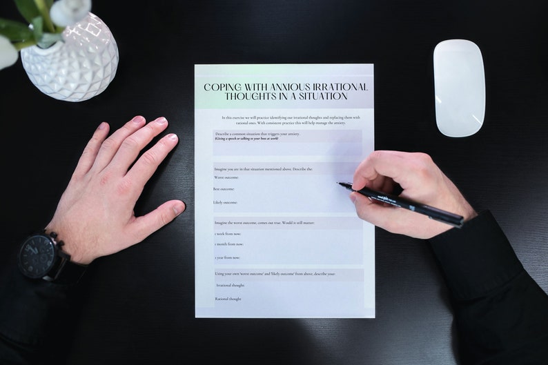 May include: A person is completing a worksheet titled "Coping with Anxious Irrational Thoughts in a Situation". The worksheet includes prompts to help identify and manage anxiety.