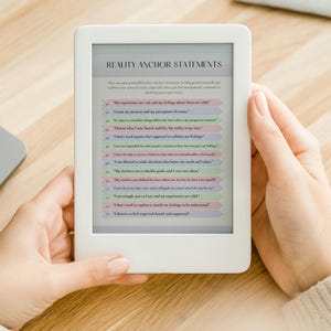 May include: A white e-reader displaying a list of "Reality Anchor Statements" in a light pink, green, and blue colour scheme. The statements are designed to help ground yourself and maintain a positive perspective.