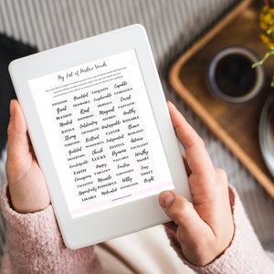 May include: A white tablet screen displaying a list of positive words in black cursive font. The list is titled "My List of Positive Words".