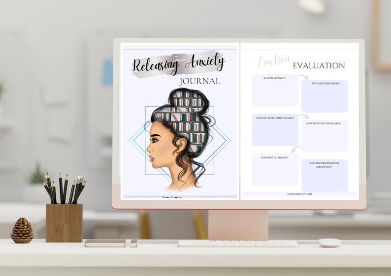 May include: A computer screen displaying a printable journal page with the title "Releasing Anxiety Journal" and a graphic of a woman with books in her hair. The right side of the screen shows a section titled "Emotion Evaluation" with a table for journaling.