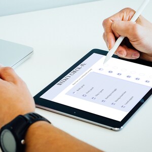 May include: A person uses a stylus to fill out a weekly check-in on a tablet. The check-in includes categories such as "Healthy goal", "Energy level", "Feeling in charge", "Morning struggle", "Past 4 hours", "Need a break", and "Loved support".