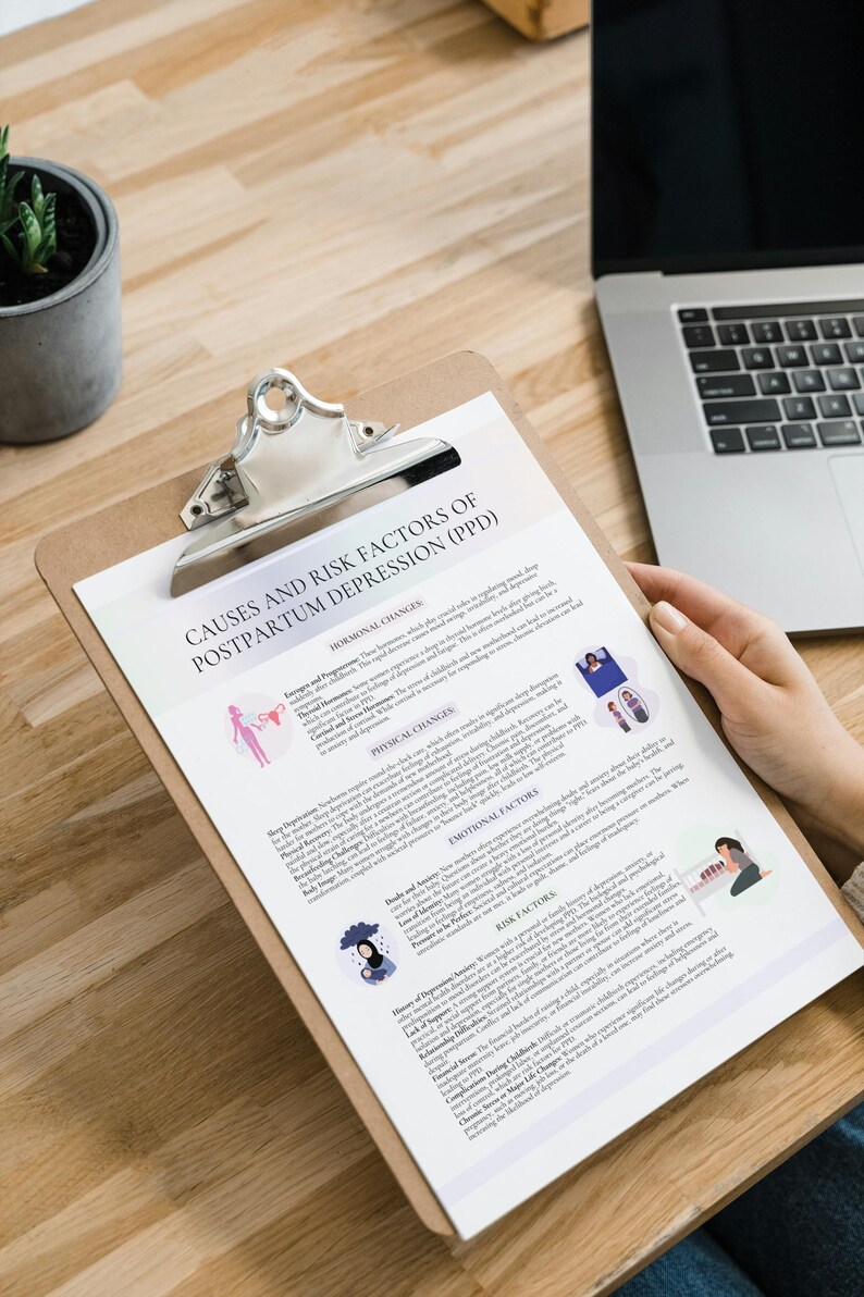 May include: A clipboard with a printed document titled "CAUSES AND RISK FACTORS OF POSTPARTUM DEPRESSION (PPD)". The document includes sections on hormonal, physical, and emotional factors, along with risk factors. A laptop and a potted plant are also visible.