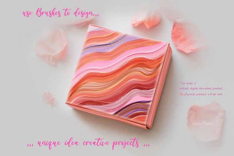 May include: A square box with a pink, orange, and purple abstract design. The box is on a white background with pink flower petals scattered around it. The text "use Brushes to design..." is at the top of the image and the text "...unique idea creative projects..." is at the bottom of the image.