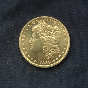 Morgan *1888* 5 dolarów - efekt złota / monety amerykańskie