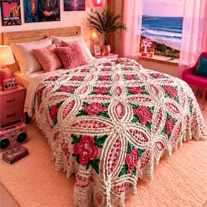 May include: A textured bedspread featuring a repeating geometric pattern of white raised tufted circles and ovals, accented with vibrant pink and green floral motifs. The fabric has a dimensional, quilted appearance with a ruffled edge finish.