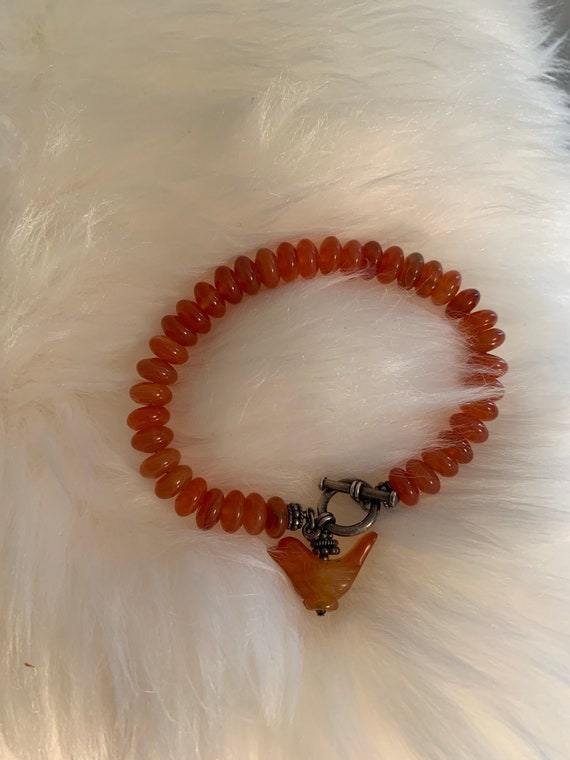 Burnt Orange Stone Bracelet with Bird Dangle