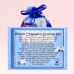 May include: A blue and white card with the text "Prison Chaplain's Survival Kit" and a list of items with descriptions. The items include coffee, a jigsaw piece, an elastic band, a paperclip, a starburst, eyes, a playing card, a key, a candle, a button, an eraser, a mint, a soldier, and a tea bag.