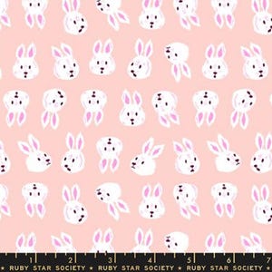 May include: A repeating pattern of white bunny faces and ears with pink accents on a light pink background. The bunnies are in various orientations. The text "RUBY STAR SOCIETY" is at the bottom.