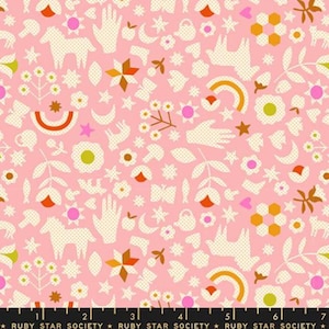May include: Pink fabric with a repeating pattern of white dotted shapes including hands, flowers, rainbows, stars, and horses. Accents of orange, yellow, and pink are scattered throughout the design. The text "RUBY STAR SOCIETY" is at the bottom.
