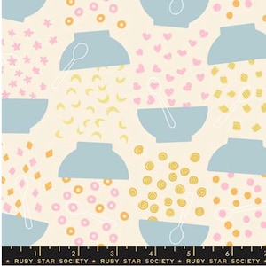 May include: Cream-colored fabric with a repeating pattern of light blue bowls, white spoons, and various shapes in pink, yellow, and orange. The shapes include stars, hearts, and spirals. The text "RUBY STAR SOCIETY" is at the bottom.