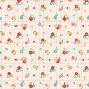 May include: A repeating pattern of small floral bouquets in red, yellow, pink, and blue, with green leaves, set against a cream-colored background with a pink grid pattern. The flowers are clustered together.