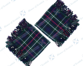 May include: Two green, blue, red, and white plaid fabric squares with fringed edges. The squares are folded in half and have a white background.