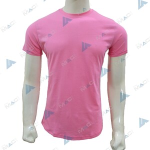 May include: A plain pink crew neck t-shirt. The short-sleeved top is presented on a white mannequin. The fabric of the shirt looks to be a soft, lightweight material. The overall style is casual and simple.