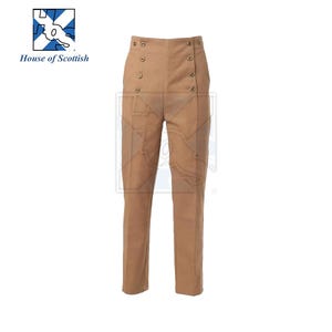 May include: Tan-colored high-waisted trousers with a button-up closure on the left side. The pants have a straight leg design and a classic, tailored look. The "House of Scottish" logo is in the upper left corner.